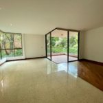 Quiet El Poblado Apartment with Large Balcony, Nice Hardwood Floors, Green Views and Two Pools