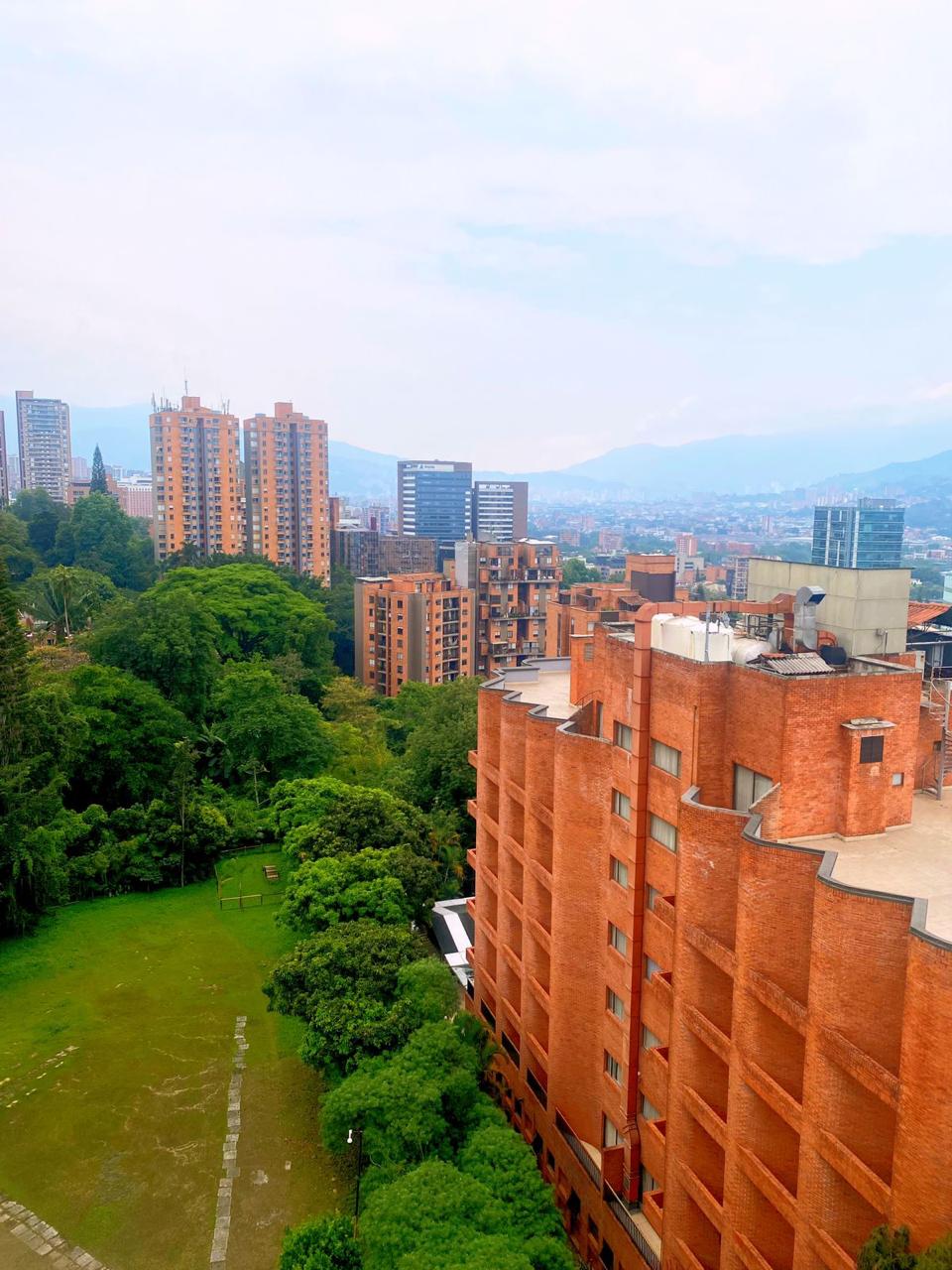 Price Reduced! Below Penthouse 4 BR El Poblado Condo With Open Spaces, Crown Moldings, Built-in Shelving & City Views