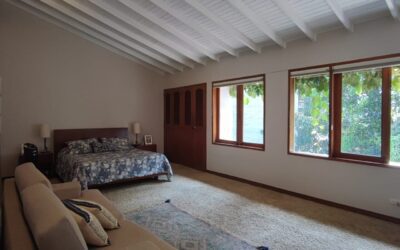 Under $95 per sq ft, Well-Located Two Level 5 BR El Poblado Gated Home; Backyard Patio, High Ceilings & Green Views