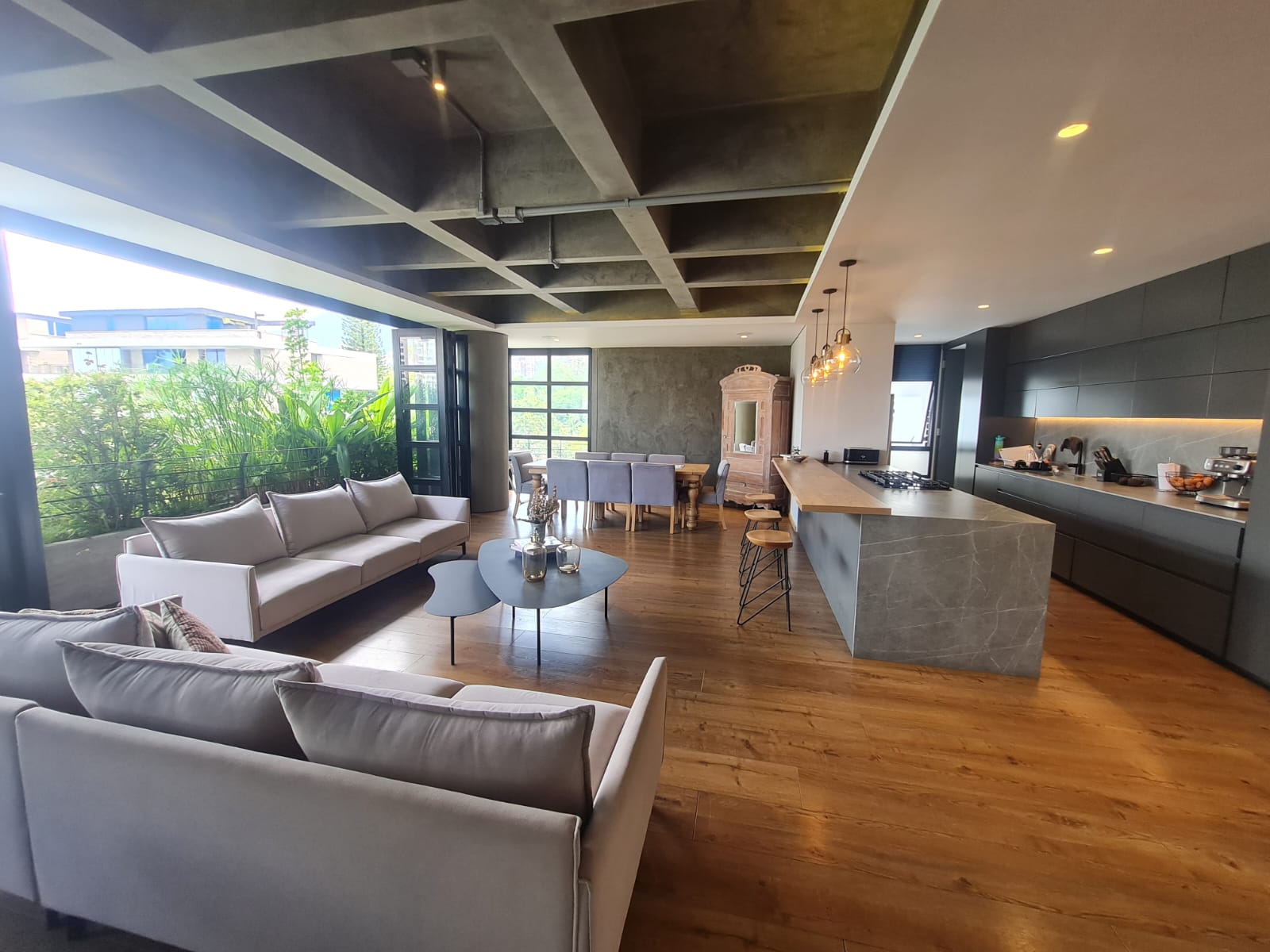 Newer, Underpriced, Industrial Style Two Level El Poblado Penthouse With 968 Square Foot Private Rooftop Terrace, Abundant Greenery and Luxurious Master Suite