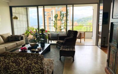 Remodeled El Poblado Apartment With Green Views, Hardwood Flooring, Amenities, and Two Units Per Floor