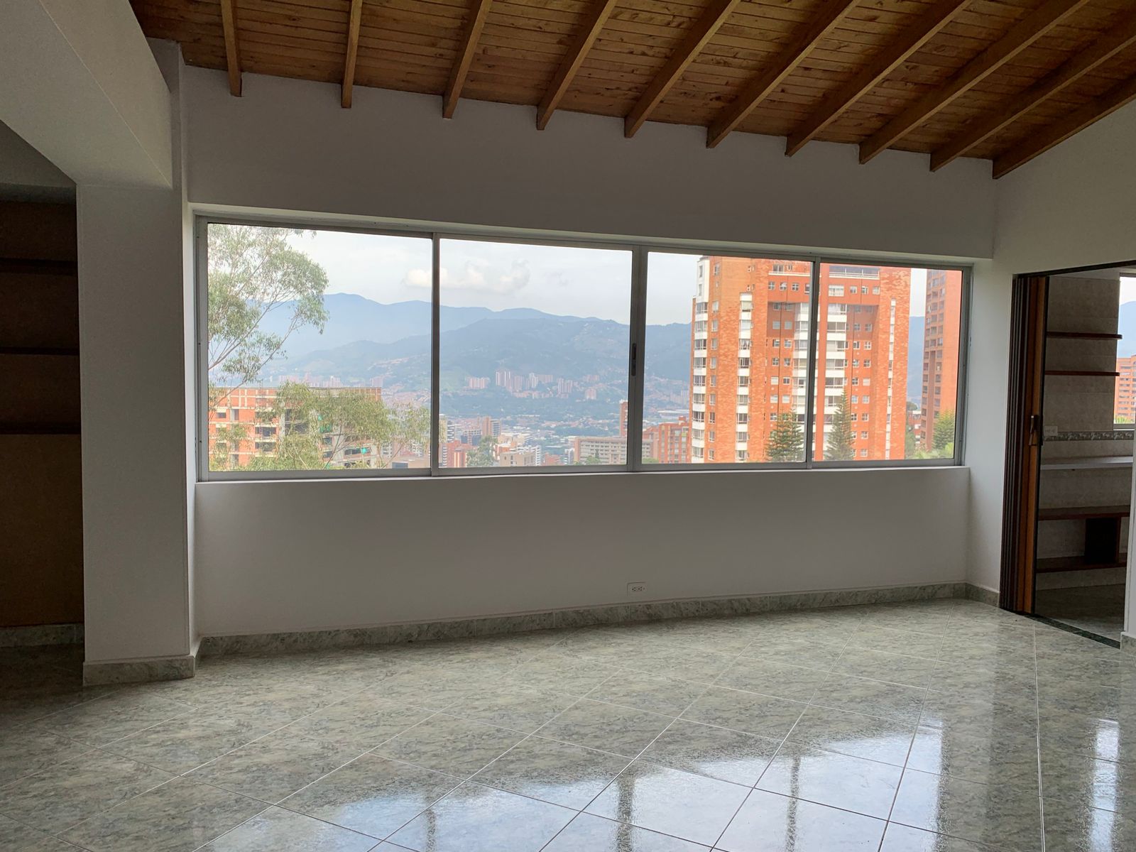 Under 100K USD 1BR El Poblado Penthouse With Low Carrying Costs and Scenic Views