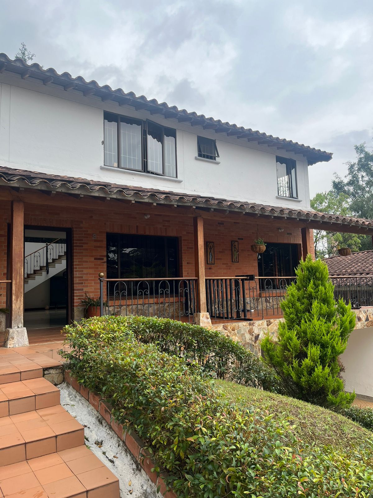 Two-Level, 3BR El Poblado Gated Community Home With Open Spaces, Backyard Terrace, and High Ceilings