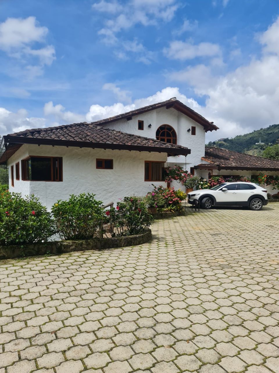 Lovely El Retiro Gated Community Finca With Soothing Lake Views, Covered Porch Space, and High Ceilings On 3.47 Acres
