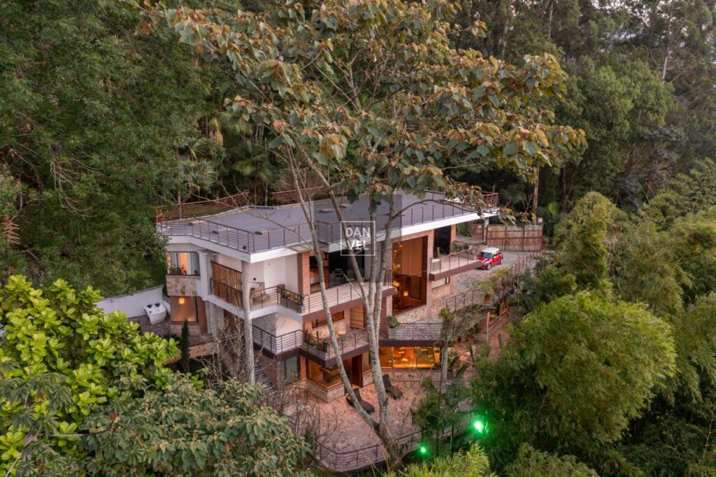 Incredible 6,996 Sq Ft Envigado New Construction Home Nestled Within A Lush Forest Just Minutes From El Poblado – Currently Operating As An Airbnb/Hotel