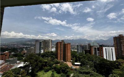 2BR El Poblado Apartment With High-Rise Views, Island Kitchen, And Low Carrying Costs