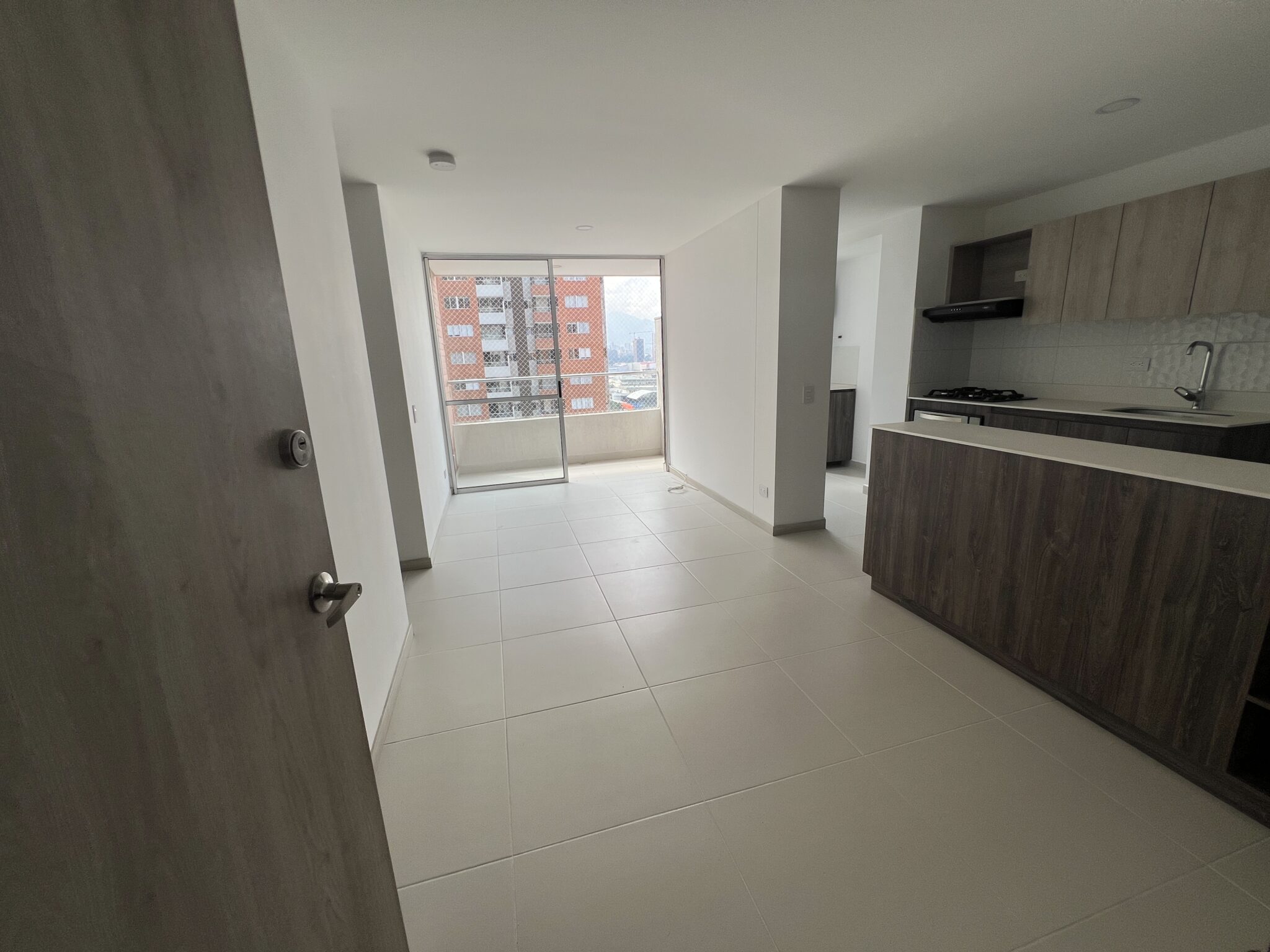 Fairly New, Low Cost 3BR El Poblado Apartment With Open Kitchen and Balcony Space