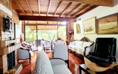 Spacious El Poblado Gated Community Home With High Ceilings, Classic Hardwood Flooring, And Soothing Outdoor Patio Space