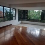 Centrally Located 3BR El Poblado Apartment With Easy Access To Entertainment Zones – Hardwood Flooring, Spacious Balcony, and Green Views