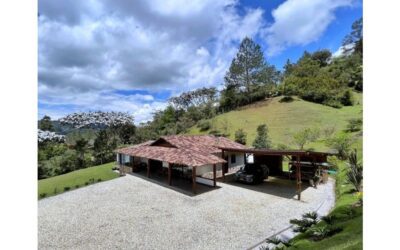 3BR El Retiro Gated Community Home – High Ceilings, Covered Porch Space, and Additional Caretaker’s House