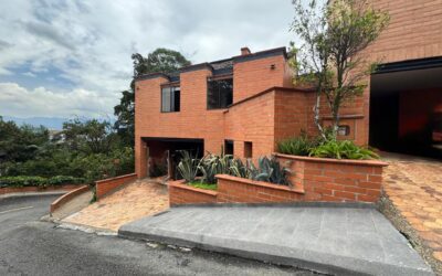 Exclusive Gated Community El Poblado Home With Remodeled Kitchen, High Ceilings, and Tranquil Backyard Space