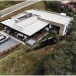 The Perfect Gated Community Home Just 20 Minutes From El Poblado – Floor-To-Ceiling Windows, Forest Views, and Relaxing Jacuzzi