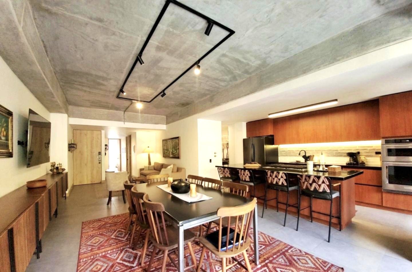 Price Reduced! Like-New, Industrial Style 3BR Laureles Apartment Just Steps From Entertainment With Low HOA Fees and One Unit Per Floor