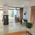 Two-Level El Poblado Townhome Steps From El Tesoro With Charming Backyard Space