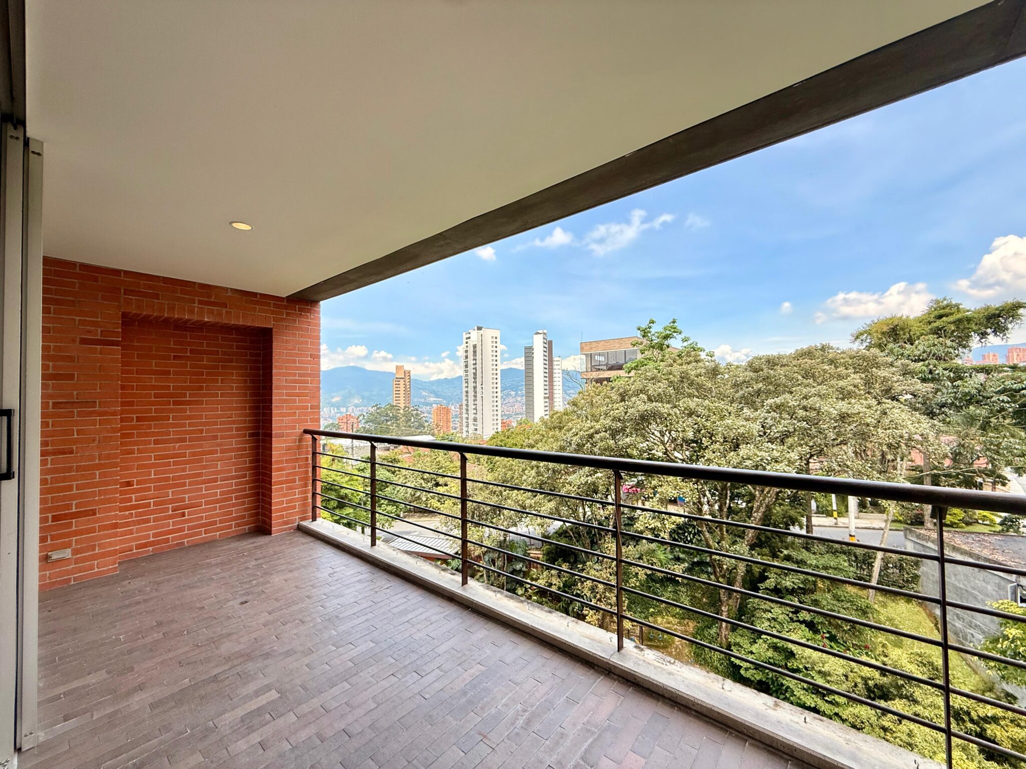 Two-Level, 2BR El Poblado Apartment With Ample Balcony Space + Views In Desirable San Lucas Area